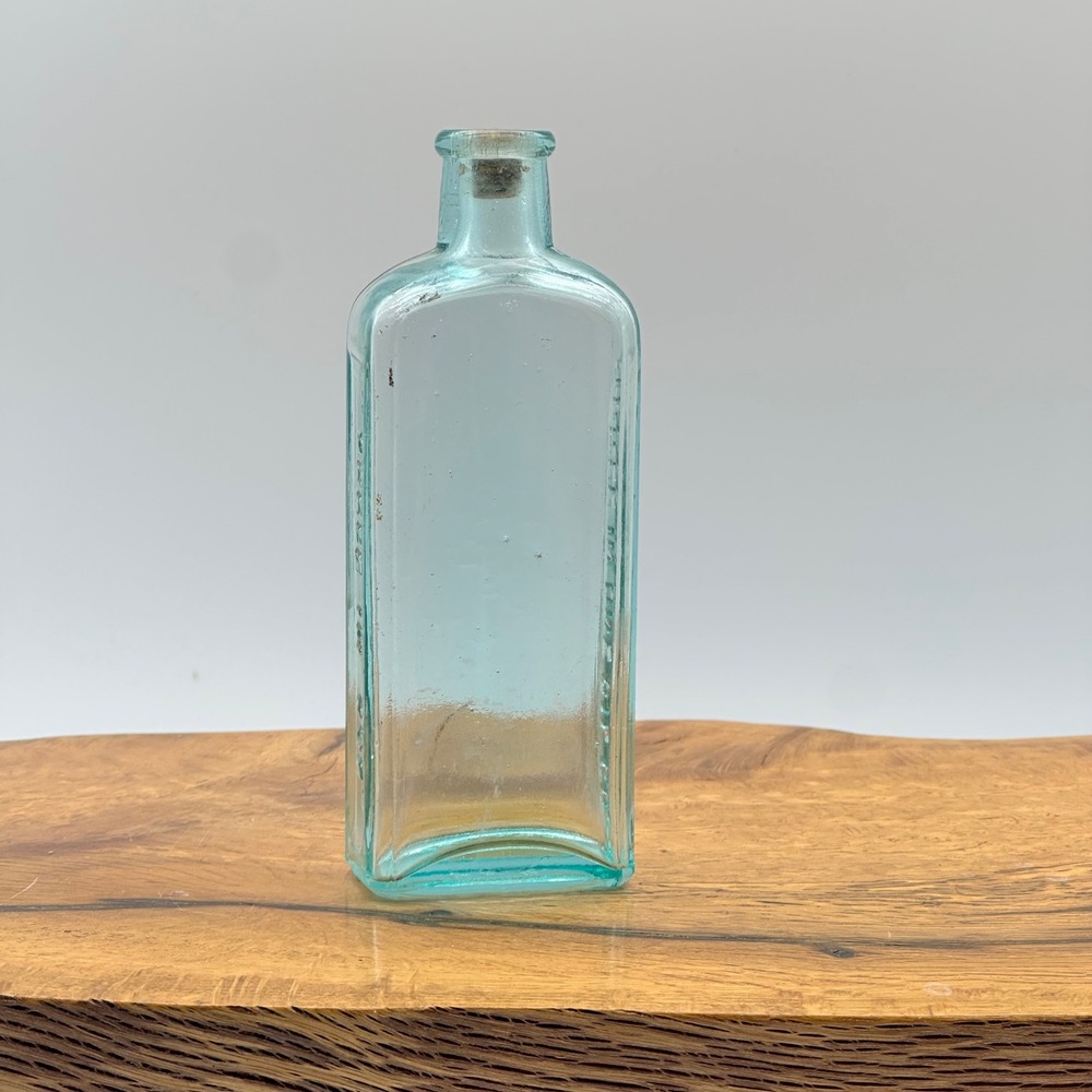 Three‎ in One Oil Co Turquoise Bottle 5.5"